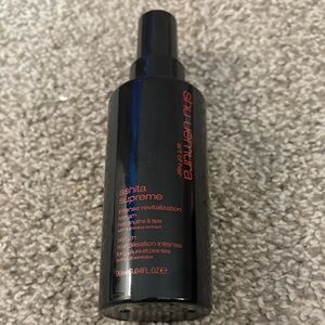 Shu Uemura Black Serum Bottle with Red Text